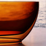 Close-up of the transparent brown resin sidewall and sculpted base.