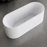 Top view into the elongated oval bathtub basin with chrome drain.