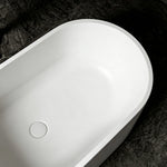 Top interior view showing the thin oval rim and color-matched drain.