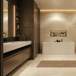 Fluted-panel back-to-wall bathtub in a warm modern bathroom.