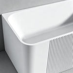 Close-up of the rounded corner and narrow fluted exterior panel.