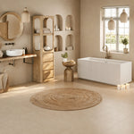 Rectangular fluted back-to-wall bathtub in a warm neutral bathroom.