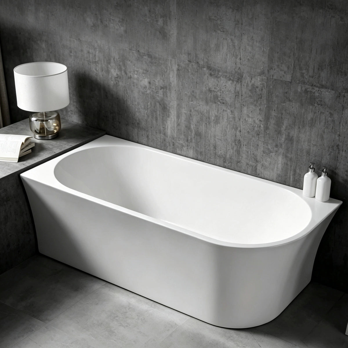 Angled view of the tapered bathtub installed against a wall.