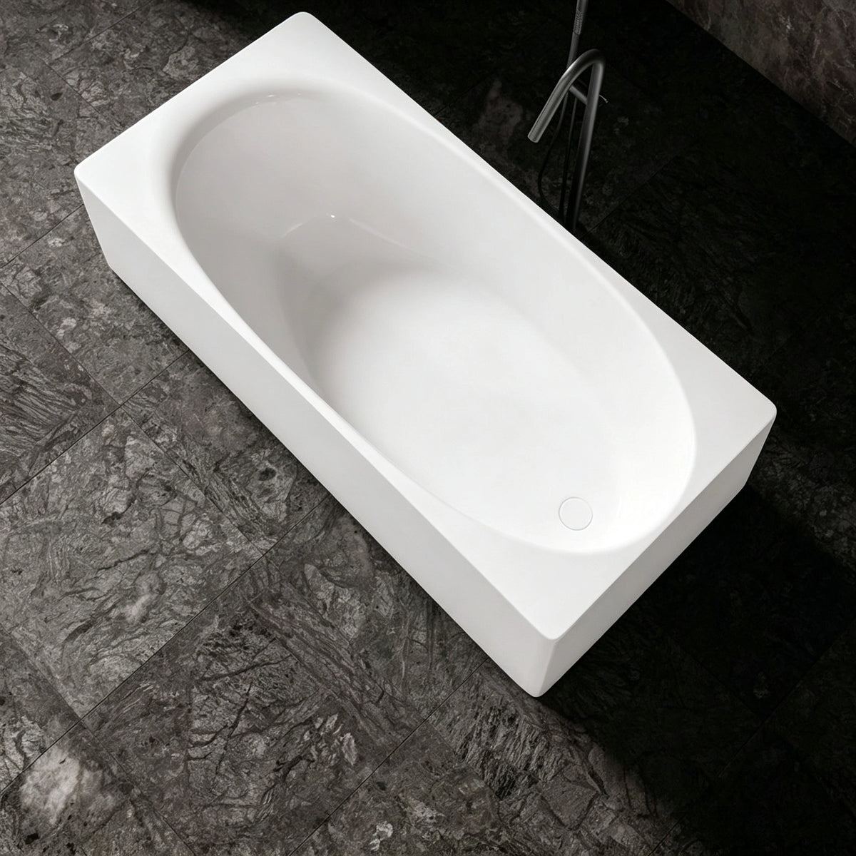 Top view of the rectangular bathtub with an oval soaking basin.