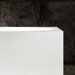Close-up of the broad rectangular rim and straight exterior wall.