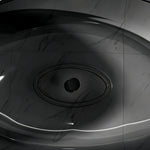 Top interior view of the transparent black bathtub basin and dark drain.