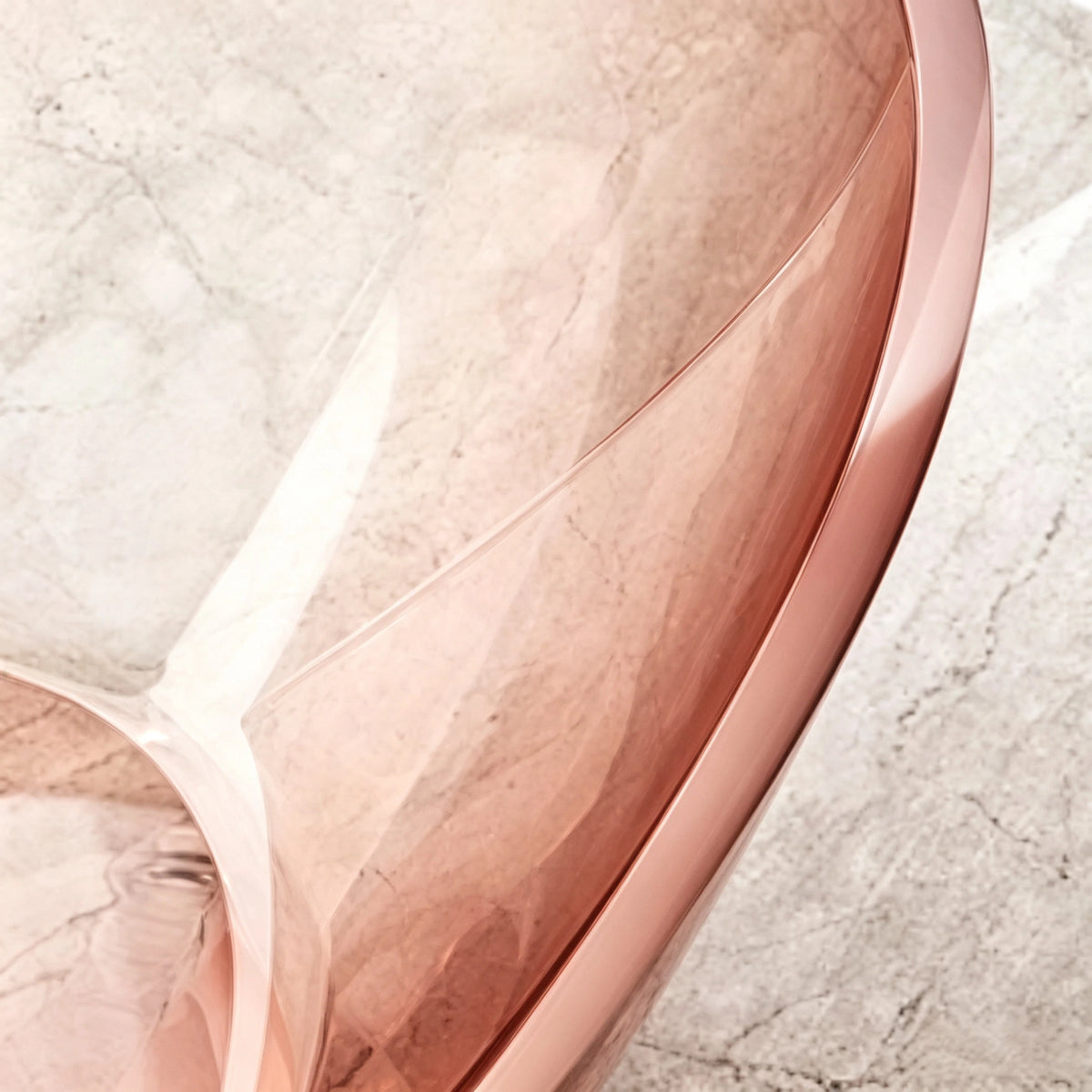 Close-up of the clear-edged rim and transparent pink resin wall.