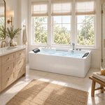 Rectangular soaking tub with 2 pillows and full faucet set, placed in bright farmhouse bathroom