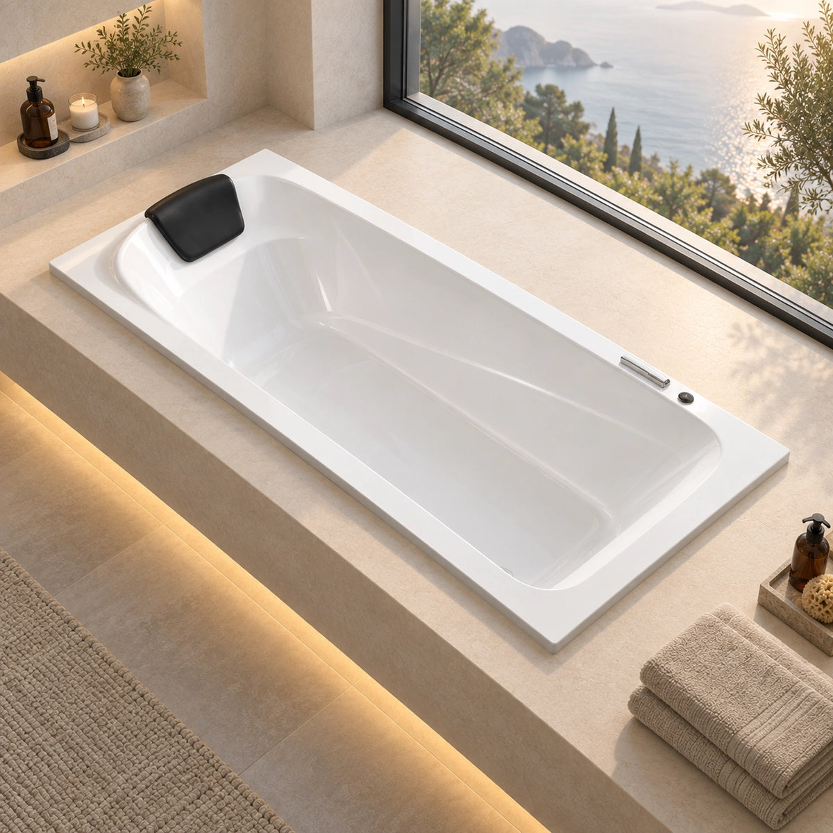 Drop-in bathtub with pillow built in sunlit bathroom with coastal scenery
