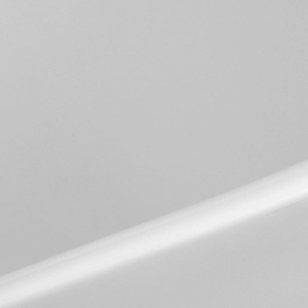 Smooth matte white surface close-up of freestanding bathtub rim