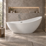 Freestanding soaking tub placed in bathroom with built-in wall niche lighting