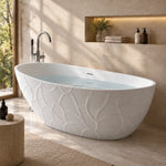 Embossed surface freestanding tub with water inside, sunlit bathroom interior