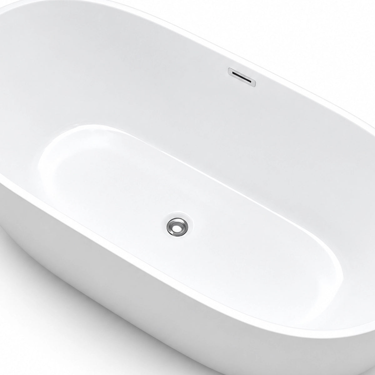 Angled interior close-up of soaking tub, overflow and drain detail view