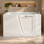 Walk in soaking tub with safety door, clean bathroom with built-in wall niche decor