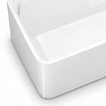 Close-up of tub corner, thick glossy white rim and rounded outer panel edge