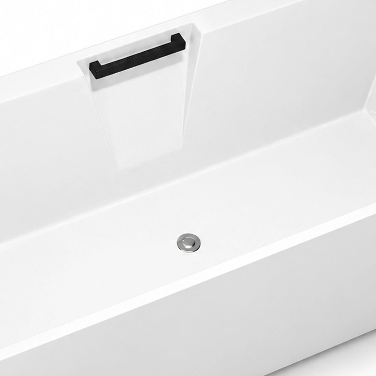 Close-up of built-in black grab handle on tub inner wall and central drain