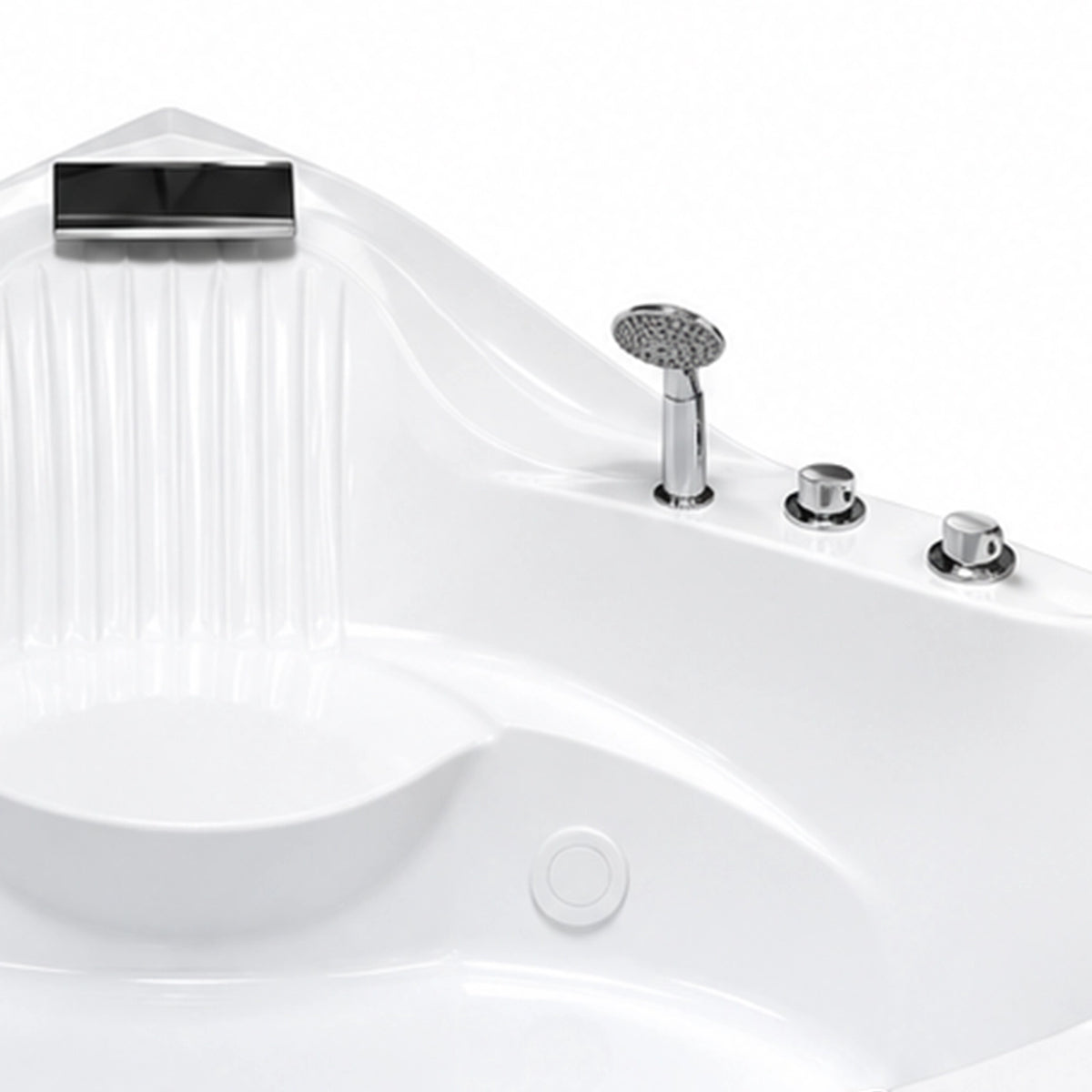 Close-up of waterfall spout, hand shower and control knobs on tub rim
