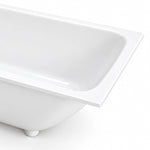 Close-up of tub rim, glossy white surface and supporting base foot detail