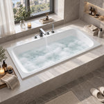 White drop-in bathtub with chrome faucet, water flowing inside bright marble bathroom
