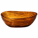 Freestanding soaking bathtub, oval shape, transparent amber finish with continuous wavy texture