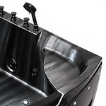 Partial shot of bathtub corner basin, curved transparent viewing panel and rim control hardware