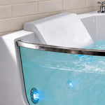 Partial detail of walk-in tub curved transparent door, white headrest and whirlpool jets with blue lights