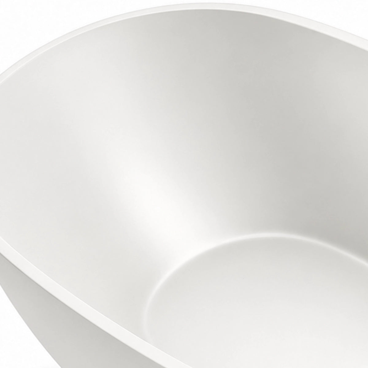 Close-up of bathtub inner wall, featuring smooth matte surface and soft curved corner