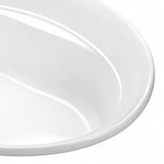 Bathtub corner close-up, high-gloss white surface, seamless curved rim and sloped interior wall