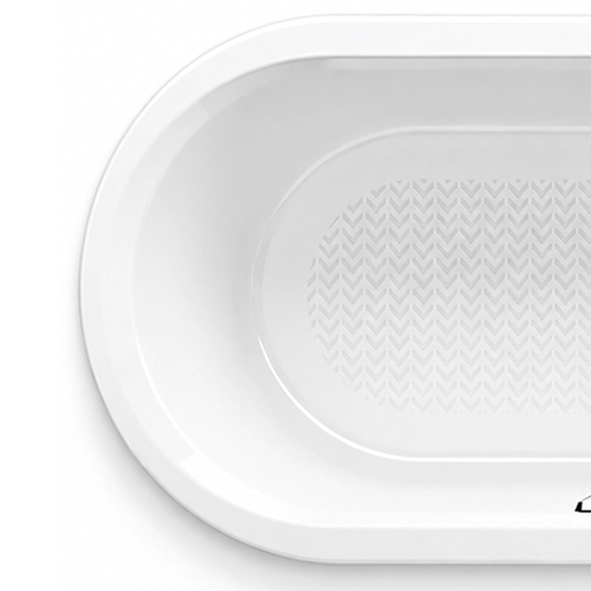 Close-up of curved bathtub end rim, smooth white acrylic edge with chevron anti-slip pattern inside the basin