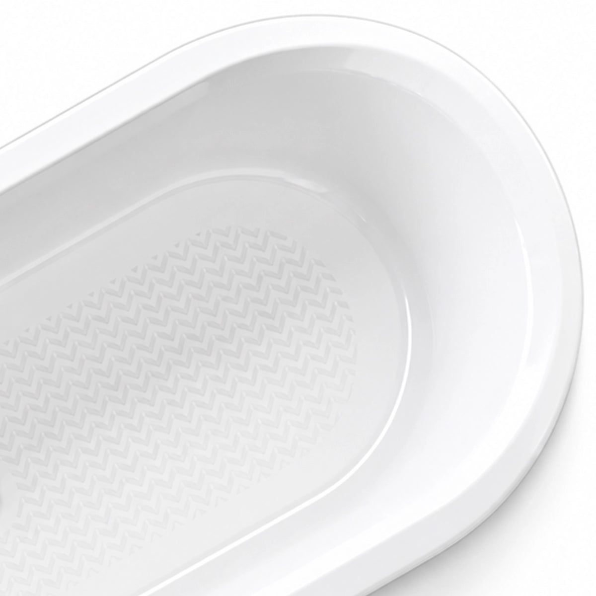 Partial close-up of bathtub corner, seamless rounded rim, anti-slip texture extending across the tub interior