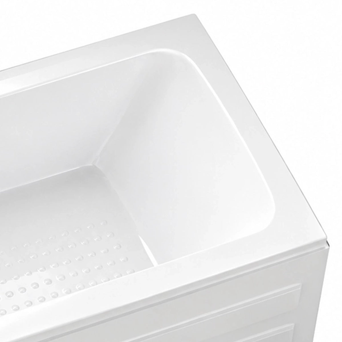 Close-up of bathtub corner, seamless inner surface, textured anti-slip base and apron moulding
