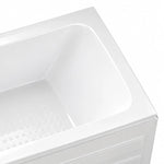 Close-up of bathtub corner, seamless inner surface, textured anti-slip base and apron moulding