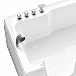 Close-up of tub top hardware, multiple chrome control knobs, hand shower and anti-slip dots inside basin