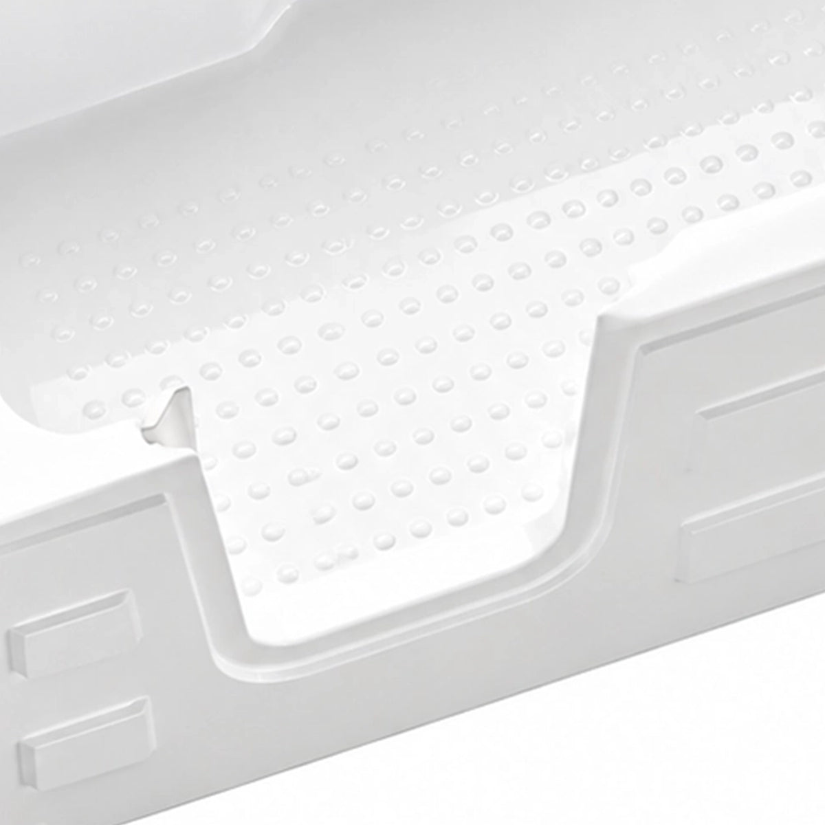 Close-up of walk-in entry door, side door frame, raised anti-slip dots and textured apron panel