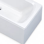 Bathtub corner close-up, glossy acrylic body, integrated skirt and smooth rim edge