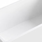 Partial shot of bathtub inner wall, seamless smooth white surface with continuous rim transition