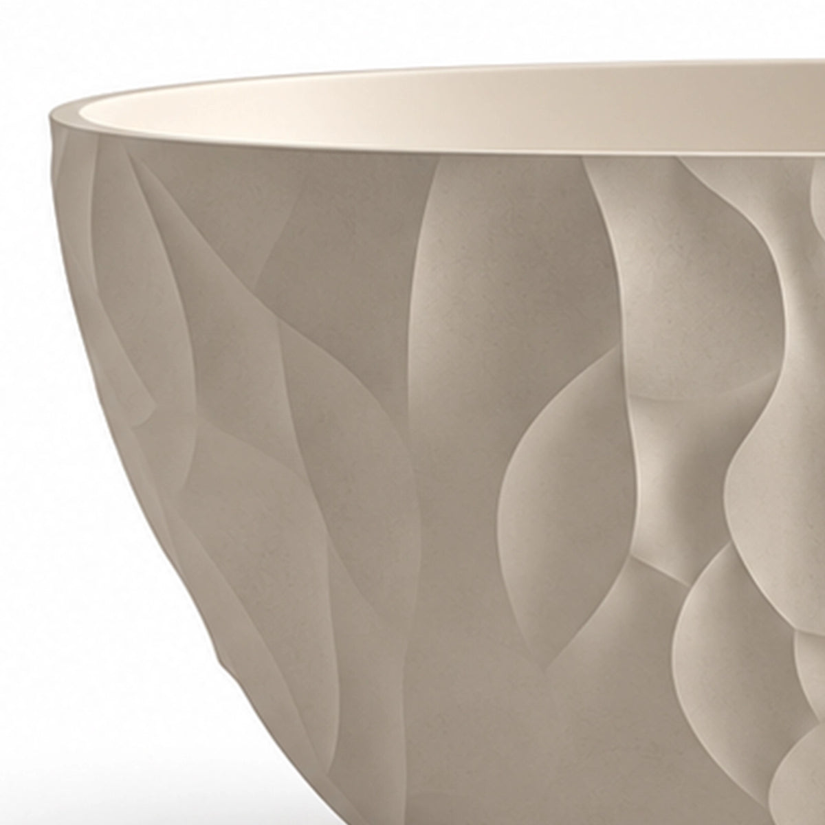 Close-up of bathtub rim, showing continuous 3D wavy relief texture on outer surface