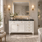 Freestanding vanity with black marble top in bright traditional bathroom
