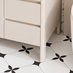 Slim round cabinet leg and bottom drawer edge detail