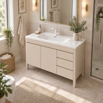 Freestanding bathroom vanity near window with natural daylight