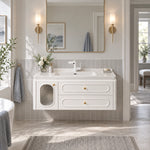White French floating bathroom vanity, luxury master bathroom scene, gold wall sconces, gold‑trim mirror, vertical light‑grey wall tiles