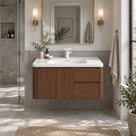Brown wood‑grain floating bathroom vanity, modern mid‑century main bathroom, gold wall sconces & gold‑frame mirror, vertical grey wall tiles, glass shower enclosure