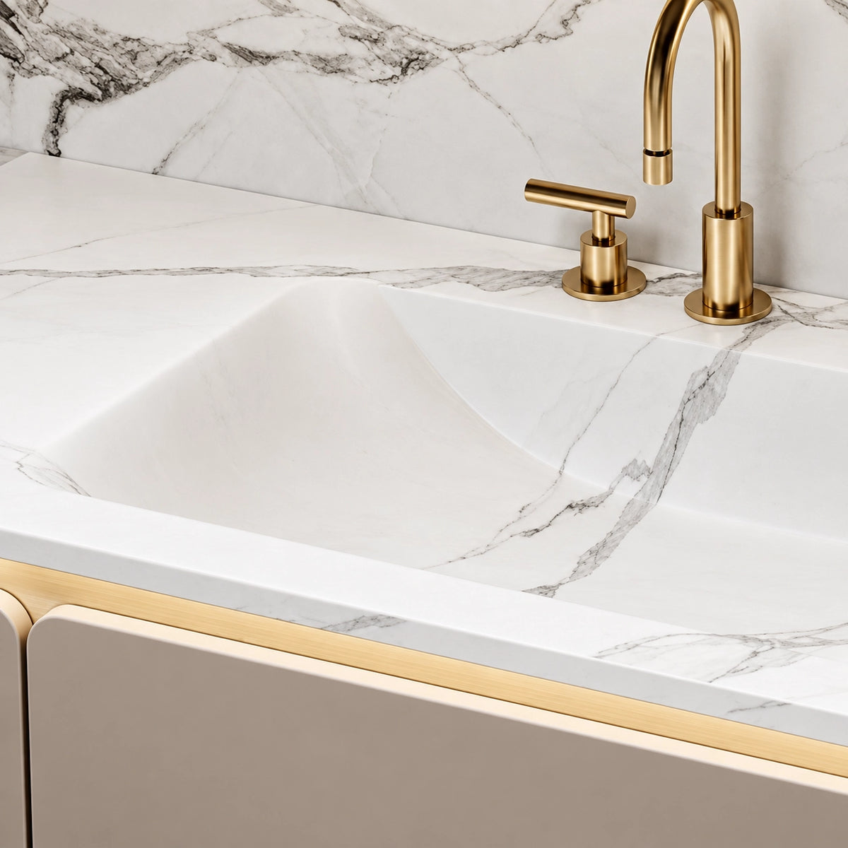 Close‑up of marble sink and brushed gold faucet set