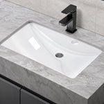 Undermount ceramic sink paired with black faucet