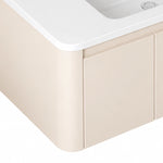 Rounded curved corner detail of cream cabinet panel
