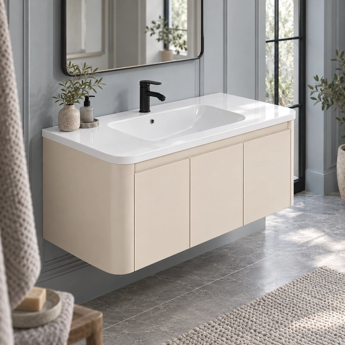 Floating cream vanity set inside soft‑toned restroom