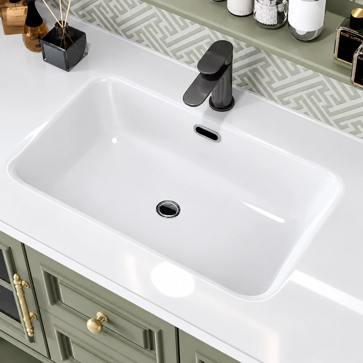 Sink close‑up, integrated white ceramic basin with black single‑hole faucet