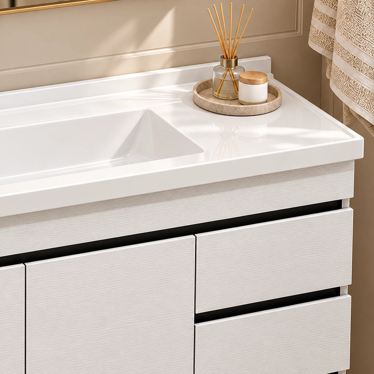Countertop detail, integrated white sink, aromatherapy set on storage tray