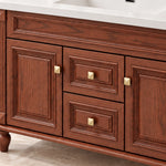 Door and drawer close‑up, embossed panel design with square gold metal knobs