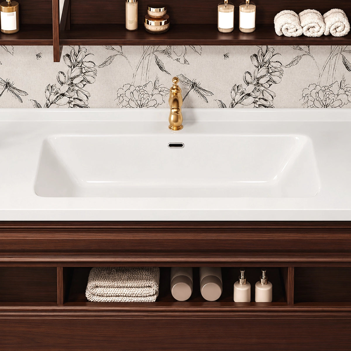 Bathroom vanity countertop and open cubbies with toiletries and folded towels